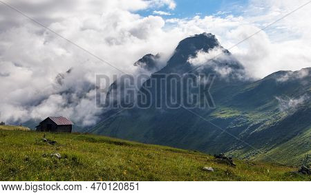 Carnic Alps In Dhe Middle Of Clouds, Carnian Alps Mountains, Italy