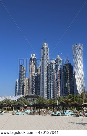 Dubai, Uae - February 14,2022: Skyscrapers At The Beach Of Dubai Marina. An Artificial Canal City St