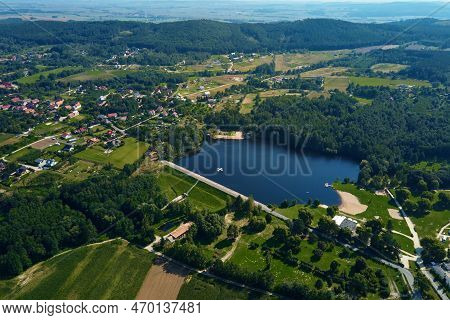 Aerial View Of Mountain Village At Summer Day. Recreation Area Near Sleza Mountain With Large Lake A