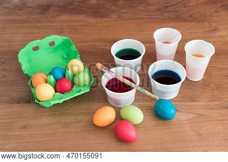 Coloring Easter Eggs With Beautiful Colors Brush And Paint Cups. Handmade Pastel Easter Egg For East