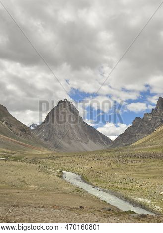 A Beautiful Sacred Mount Gumbok Rangan (gonbo Rangjon) With Flowing Kargyak River In Darcha-padum Ro