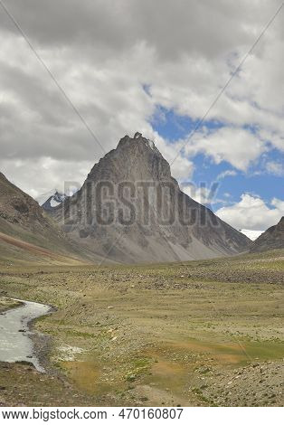 A Beautiful Sacred Mount Gumbok Rangan (gonbo Rangjon) With Flowing Kargyak River In Darcha-padum Ro