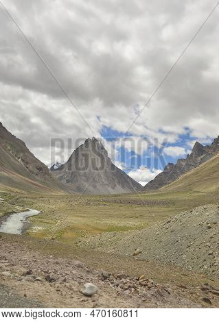 A Beautiful Sacred Mount Gumbok Rangan (gonbo Rangjon) With Flowing Kargyak River In Darcha-padum Ro