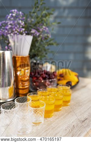Glasses Of Cocktails On The Bar. Glasses Of Sparkling Wine With Red Alcohol. Preraring Aperol Spritz