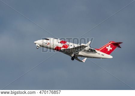 Zurich, Switzerland, January 20,2023 Rega Swiss Air Ambulance Bombardier Challenger 650 Aircraft Tak