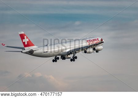 Zurich, Switzerland, January 20,2023 Swiss International Airlines Airbus A340-313 Aircraft Takeoff F
