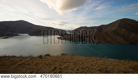 Panorama View Of Mountain Lake Nature Landscape On Benmore Peninsula And Waitaki River In Canterbury