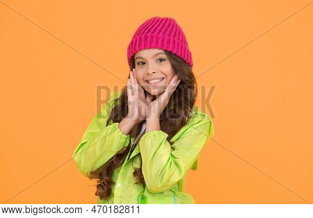 Choose Between Cutest And Trendiest. Kid Girl Wear Knitted Hat. Winter Hat Accessory. Girl Long Hair