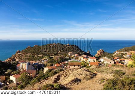 Small Touristic Town, Nebida, On The Sea Coast. Sardinia, Italy. Sunny Day,