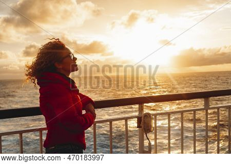 People Enjoying Travel And Adventure Lifestyle. One Woman On Ferry Ship Boat Enjoy Sunset Sunlight C
