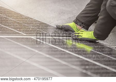 The Solar Panel Installer Connects The Modules Together. Installation Work On The Roof, Connection A