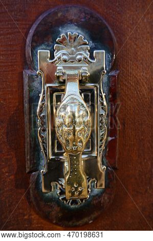 European Vintage Old Metal Wrought Iron Door Knocker. Design Detail. Paris.