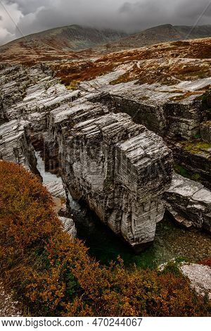 Autumn Mountain Landscape Of Rondane National Park In Norway, Waterfall Near Peer Gynt Hytta