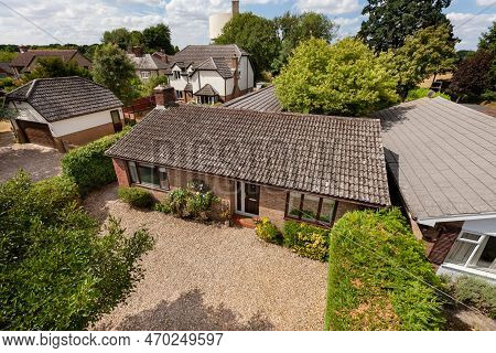 Ditton Green, Suffolk, England - July 24 2018: Rooftop View Of Village Bungalow And House