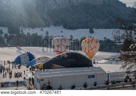 Chateau-d'oex,vaud, Switzerland - 23 January 2023: Hot Air Balloon. People Working For The Preparati