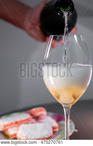 Glasses Of Sparkling White Wine Champagne Or Cava With Bubbles And Sweet Dessert Reims Rose Biscuits