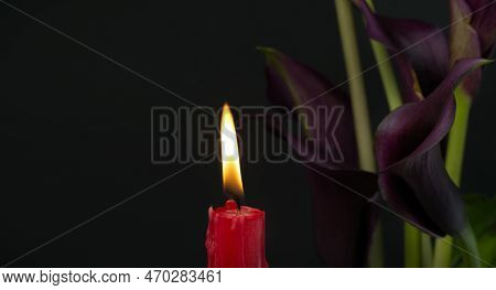 Banner Size Image Of Burning Candle And Purple Sepals Of The Calla Lily Against A Black Background W