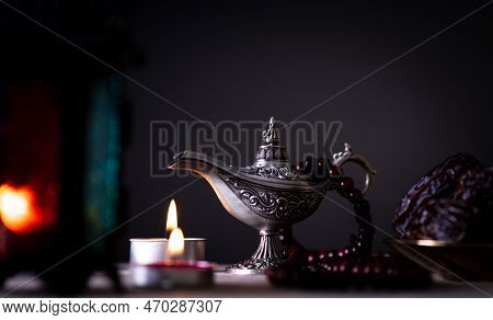 Ramadan Food And Drinks Concept.  Ramadan Lantern With Arabian Lamp, Wood Rosary, Tea, Dates Fruit A