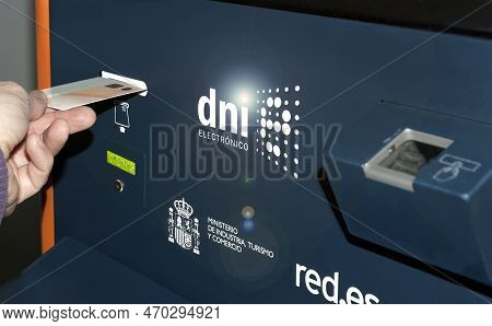 Madrid, Spain, 09-11-2022, A Person Enters Their National Identity Document At An Electronic Id Upda