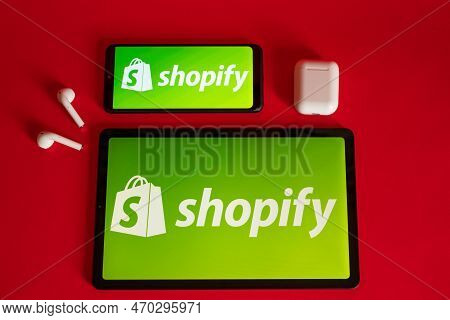 Tokio, Japan - June 05, 2022: Shopify Web Page Displayed On A Modern Laptop, Smartphone And Notebook