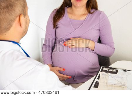 Pregnant Girl At The Doctor's Consultation. Urinalysis Study, Bacteria And Protein In The Urine. Kid