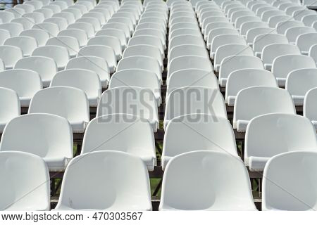 Seats Of Tribune On Sport Stadium. Concept Of Fans, Chairs For Audience, Cultural Environment Concep
