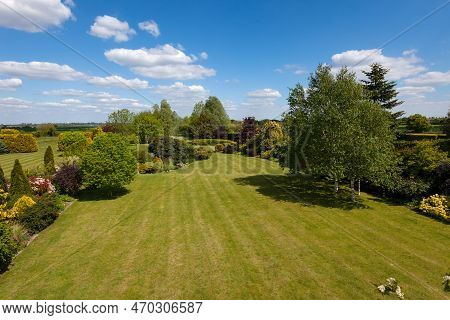 Little Downham, Cambridgeshire, England - May 19 2019: Landscaped Grounds And Countryside Viewed Fro