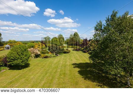 Little Downham, Cambridgeshire, England - May 19 2019: Landscaped Grounds And Countryside Viewed Fro