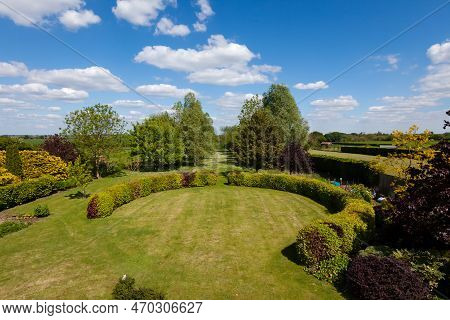 Little Downham, Cambridgeshire, England - May 19 2019: Landscaped Grounds And Countryside Viewed Fro