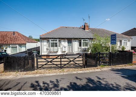 Newmarket, Suffolk, England - August 31 2018: White Extended Detached Bungalow Viewed From Highway.