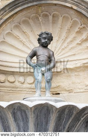 The 'mannekin Pis' Medieval Statue And Fountain, In Geraardsbergen, East Flanders, Belgium. The Stat
