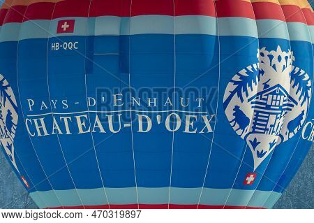 Chateau-d'oex,vaud, Switzerland - 23 January 2023: Hot Air Balloon Flying In The Sky. Hot Air Balloo