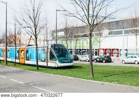 Strasbourg, France - Mar 28, 2015: Tilt-shift Lens View Of New Tramway Operated By Cts In Motion Nea