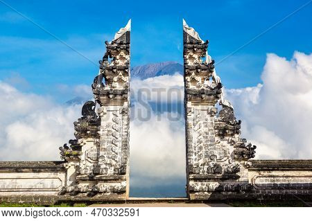 Ancient Gate At Pura Penataran Agung Lempuyang Temple And Volcano Agung On Bali, Indonesia In A Sunn