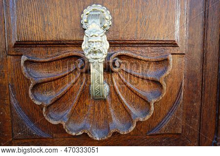 European Vintage Old Metal Wrought Iron Door Knocker. Design Detail. Paris.