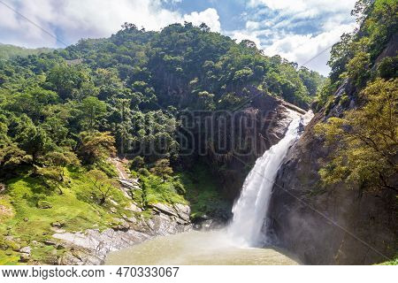 Dunhinda Waterfall In A Sunny Day In Sri Lanka