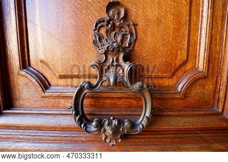 European Vintage Old Metal Wrought Iron Door Knocker. Design Detail. Paris.