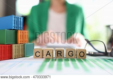Heap Of Various Shipping Containers And Word Cargo Collected From Wooden Cubes In Financial Report, 