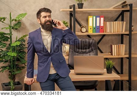 Reimagined Mobile Experience. Happy Man Talk On Phone In Office. Mobile Communication