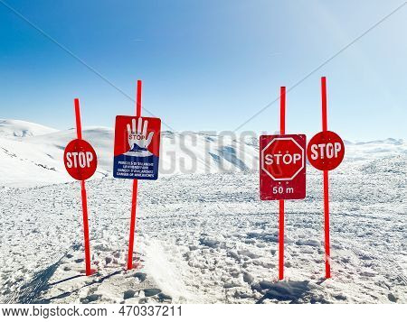 Avalanche Danger Top Off Piste Sign Posts In Snowy Mountains In Georgia. Goderdzi Ski Resort In High