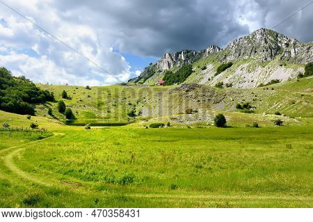 Scenic Landscape Of Mountain Valley With Bukumirsko Lake In Alps Of Montenegro. Stunning View Of Mou