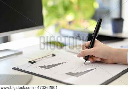 Close-up Image Of A Professional Businesswoman Or Female Financial Analyst Working On Financial Repo