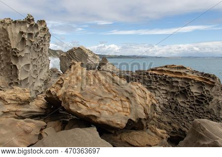 The View Of Coastline With Big Rocks And Blue Sea On Background, Auckland, New Zealand.