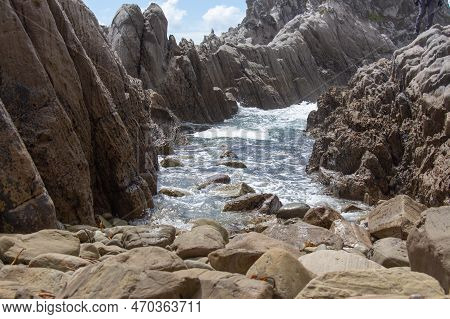 The View Of Seascape With Rocks And Blue Sea In A Sunny Day, Near Mangawhai Heads, Auckland, New Zea