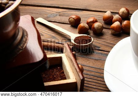Coffee Grinder And Cup  Background And Chocolate