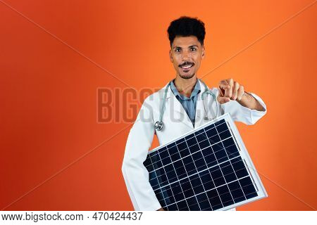 Doctor Or Veterinarian Isolated On Orange Background. Black Young Doctor Medical Resident With Steth