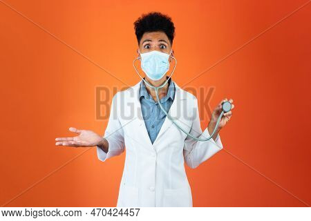 Doctor Or Veterinarian Isolated. Black Young Doctor Medical Resident With Stethoscope And Pandemic M