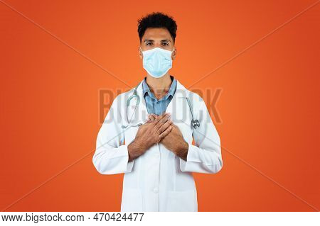 Doctor Or Veterinarian Isolated. Black Young Doctor Medical Resident With Stethoscope And Pandemic M