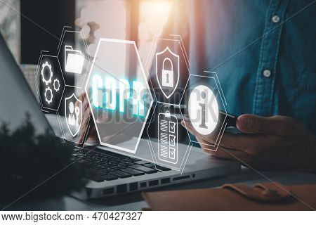Gdpr, General Data Protection Regulation Concept, Person Using Laptop And Smart Phone On Office Desk