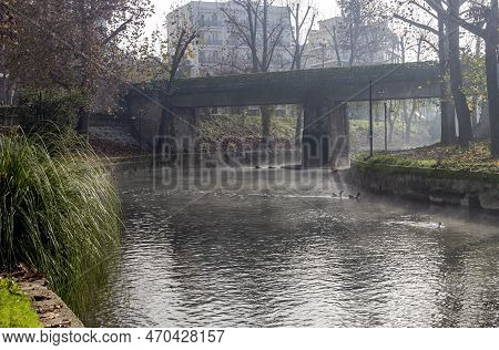 View Of The City Of Trikala, Recreation Area, Bridge And The Embankment Of The Historical Litheos Ri